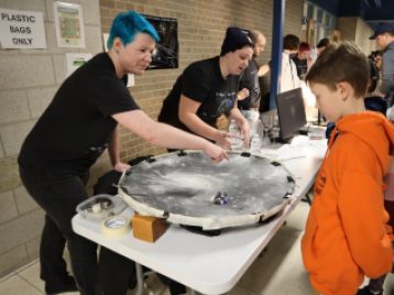 UM Astronomy Graduate Students at Outreach Event 
